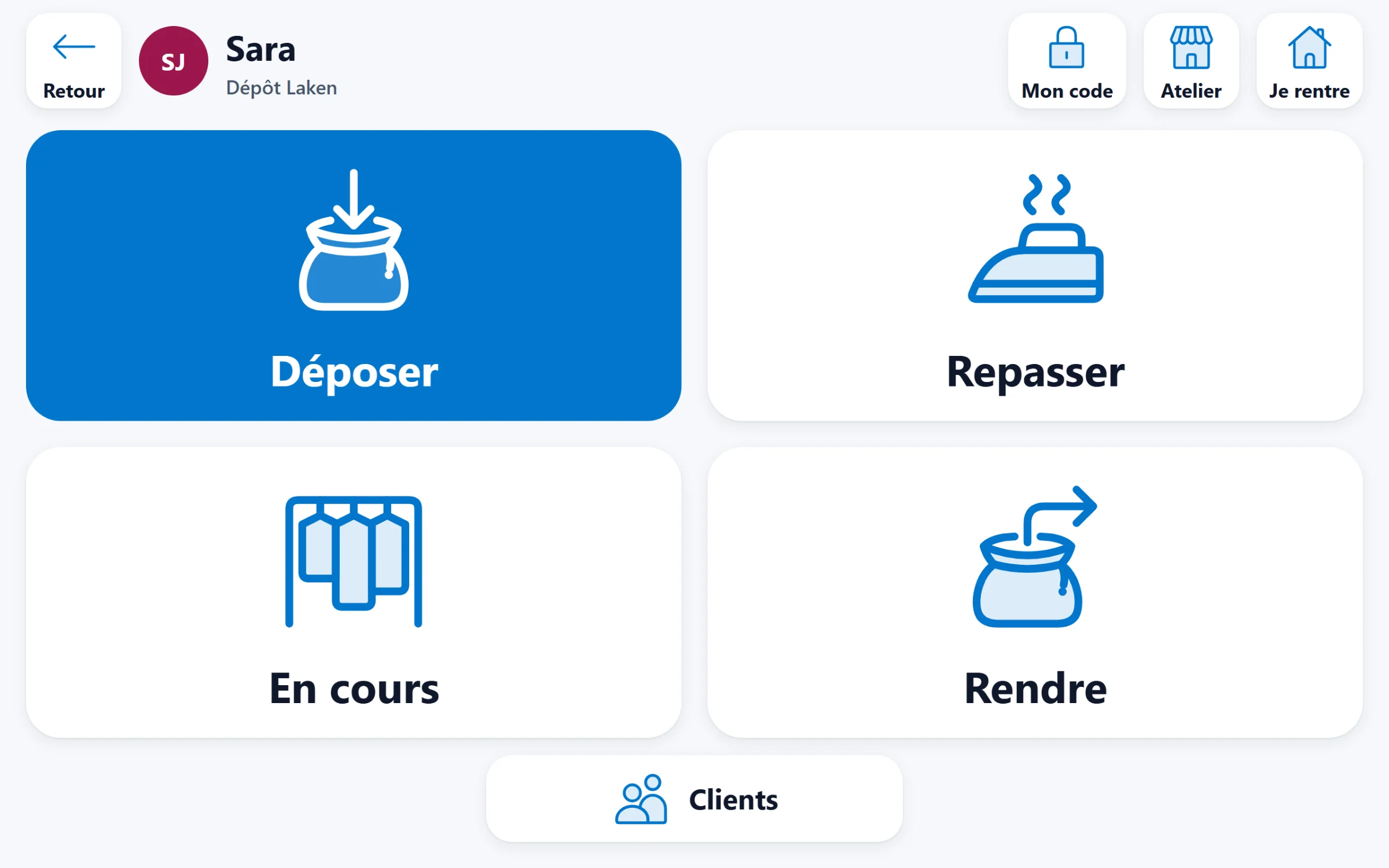 Startscherm van de depot-app op tablet: grote knoppen met tekeningen om strijkgoed binnen te nemen, te strijken, op te volgen en mee te geven